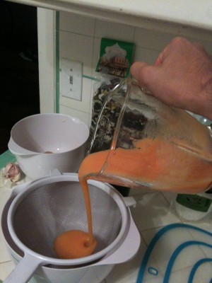 straining out the pulp